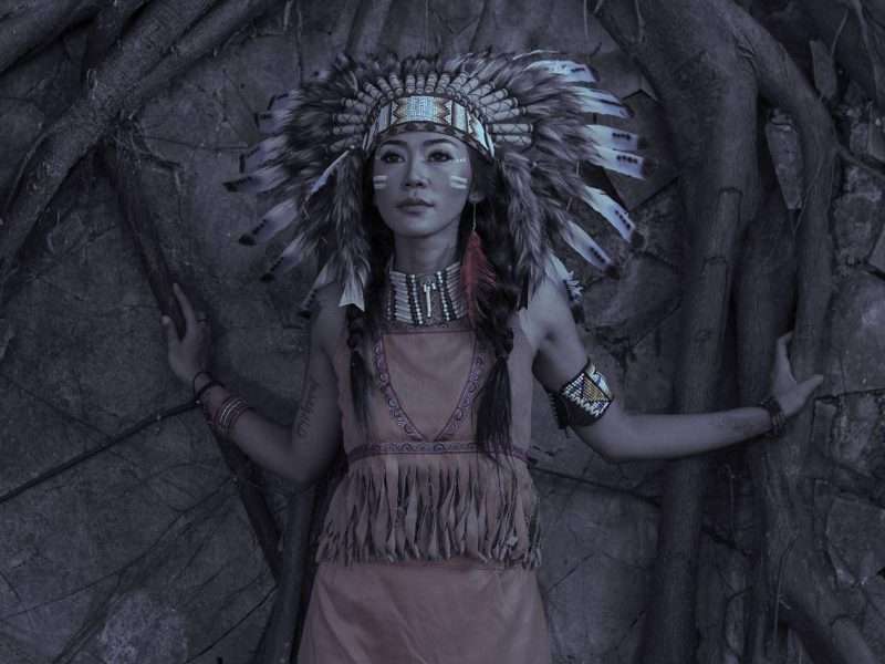 Girll with Native American-like costumes.