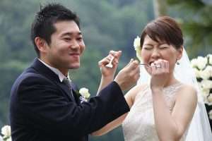 A couple eating their cake